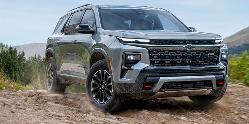 Chevy Traverse parked near mountain